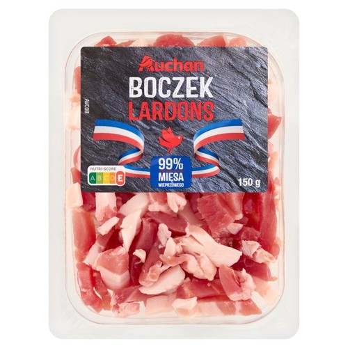 Opakowanie 150 g boczku wieprzowego Auchan Lardons. Widoczne kawałki mięsa i tłuszczu.