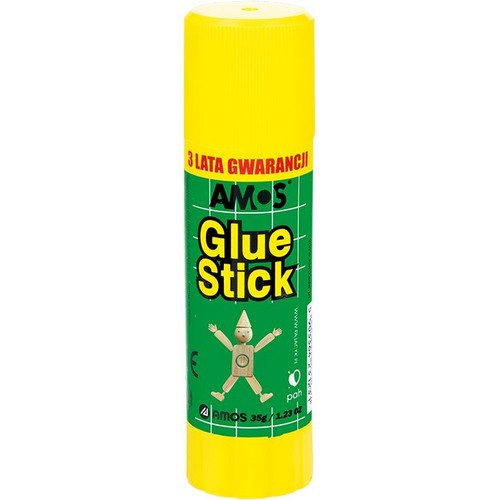 Klej w sztyfcie AMOS Glue Stick o wadze 35g. Opakowanie ma żółtą zakrętkę i podstawę, a etykieta jest zielona z białym wzorem kratki. Na etykiecie widnieje napis "Glue Stick", logo AMOS, informacja "3 lata gwarancji" oraz rysunek drewnianej kukiełki.