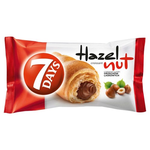 Opakowanie 7 DAYS Hazelnut croissant. Na nim grafika rogalika z nadzieniem orzechowym i orzechów laskowych.