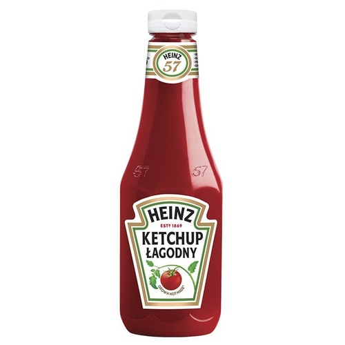 Butelka ketchupu Heinz Łagodny o pojemności nieokreślonej, z białą zakrętką. Etykieta zawiera nazwę marki Heinz, informację "Ketchup Łagodny" oraz grafikę świeżego pomidora. Na szyjce butelki widoczne logo "Heinz 57".