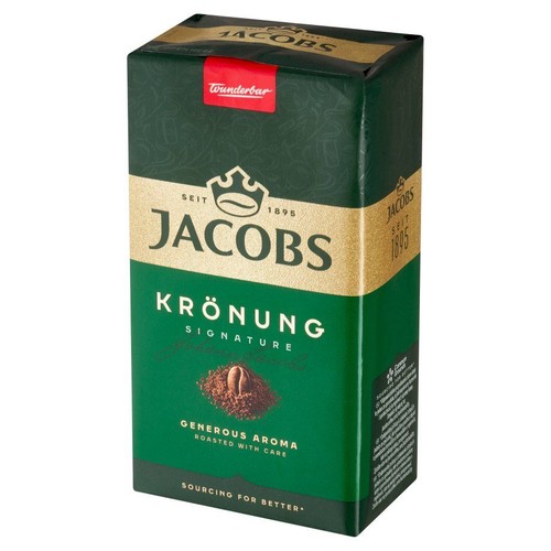 Kawa Jacobs Krönung Signature w zielonym opakowaniu z elementami złotymi. Widoczny napis "Od 1895".