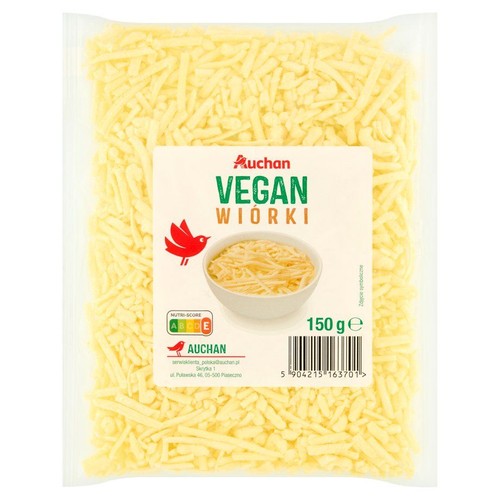Wiórki wegańskie Auchan w przezroczystym opakowaniu, 150g. Produkt ma jasnożółty kolor.