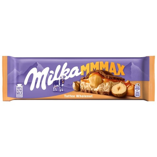 Czekolada Milka MMMAX Toffee Wholenut. Fioletowe opakowanie z napisem Milka i krową. Grafika prezentuje przekrój czekolady z toffi i całymi orzechami laskowymi. Wykonana ze 100% alpejskiej czekolady mlecznej.