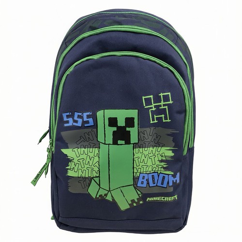 Granatowy plecak z zielonymi zamkami. Na przodzie duży zielony Creeper z Minecrafta i napisy "TNT", "BOOM".