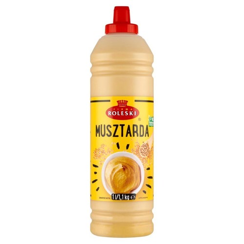 Butelka musztardy Roleski o pojemności 1 litra (1.1 kg) z czerwoną nakrętką. Opakowanie jest w kolorze jasnobeżowym. Na żółtej etykiecie widnieje logo firmy, duży napis "MUSZTARDA" oraz grafika miseczki z musztardą i rozsypanymi ziarnami.