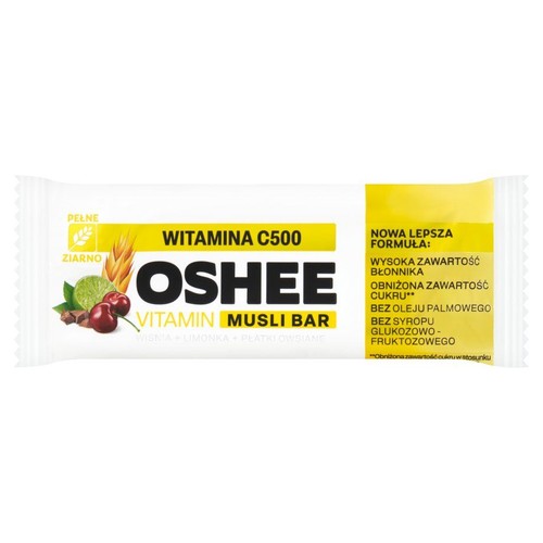 Baton OSHEE Vitamin Musli Bar z witaminą C500 w białym opakowaniu. Zawiera pełne ziarno, wiśnię, limonkę i płatki owsiane. Nowa, lepsza formuła bez oleju palmowego i syropu glukozowo-fruktozowego. Obniżona zawartość cukru.