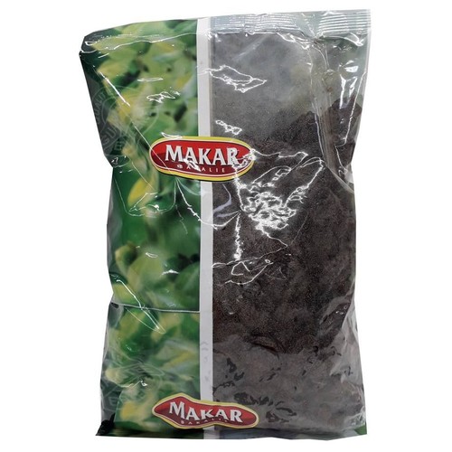 Opakowanie 1 kg suszonych śliwek bez pestek marki Makar. Widoczne ciemne, pomarszczone owoce w przezroczystej części.