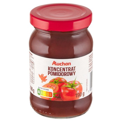 Słoik koncentratu pomidorowego Auchan z czerwoną zakrętką. Na etykiecie grafika pomidorów i waga 190 g.