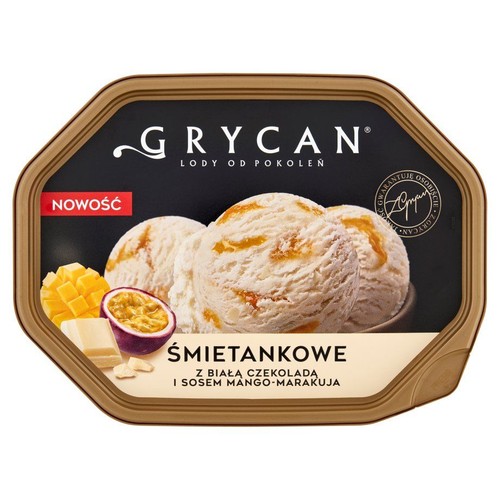 Grycan lody śmietankowe z białą czekoladą i sosem mango-marakuja w brązowym opakowaniu. Widoczne gałki lodów, mango i czekolada.