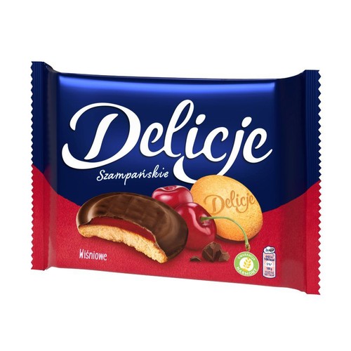 Ciemnoniebieskie opakowanie Delicji Szampańskich Wiśniowych. Grafika przedstawia ciastka biszkoptowe z wiśniową galaretką.