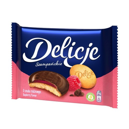 Opakowanie Delicji Szampańskich o smaku malinowym. Na opakowaniu biszkopt z galaretką malinową w czekoladzie, maliny i czekolada.