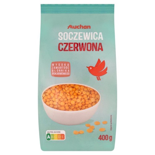 Zielone opakowanie soczewicy czerwonej Auchan, 400 g. Na opakowaniu miska z soczewicą i czerwony ptak. Wysoka zawartość błonnika.