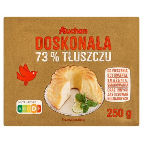 Opakowanie margaryny Auchan "Doskonała" 73% tłuszczu, 250 g. Na opakowaniu grafika babki i zastosowania kulinarne.