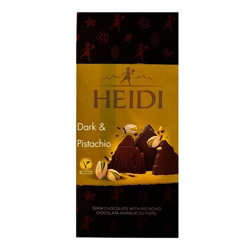 Opakowanie czekolady HEIDI Dark & Pistachio. Produkt to ciemna czekolada z pistacjami, oznaczona jako wegańska. Na czarno-złotym opakowaniu widnieje grafika przedstawiająca kawałki ciemnej czekolady i świeże, łuskane pistacje.