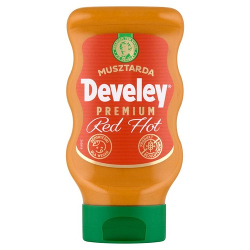 Butelka musztardy Develey Premium Red Hot w kolorze pomarańczowym. Etykieta jest czerwona z białym logo Develey i nazwą produktu. Na etykiecie znajdują się ikony potwierdzające, że produkt jest wegański i bezglutenowy.